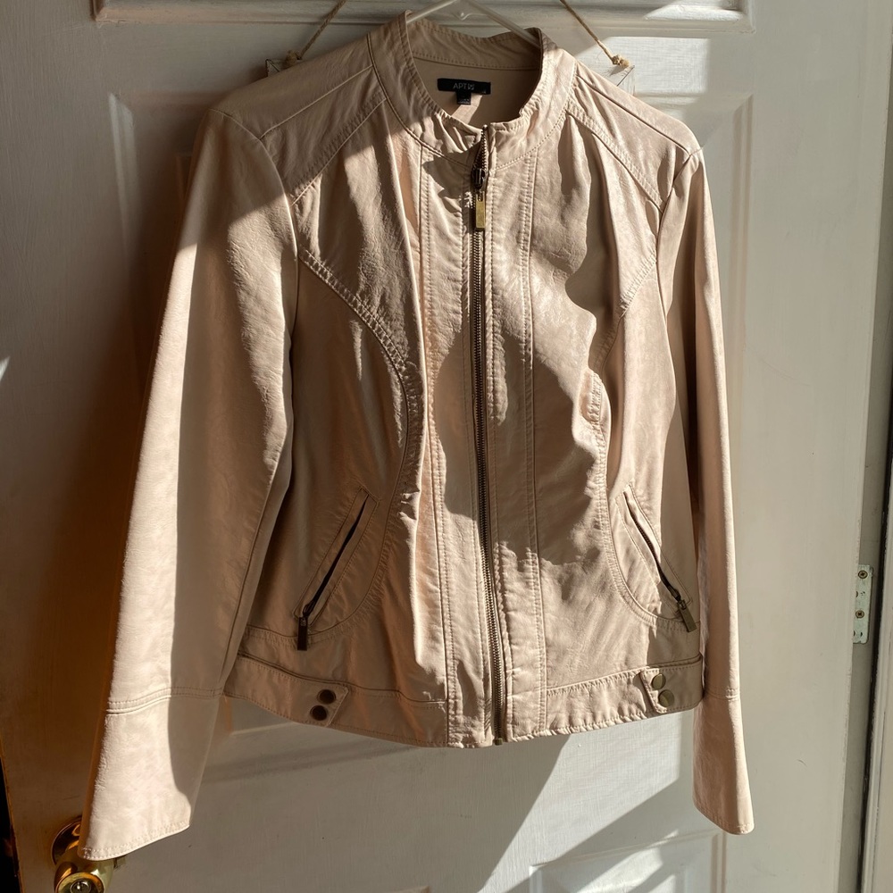 Light pink imitation leather jacket.